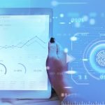 Businesswoman using a tablet to show financial report