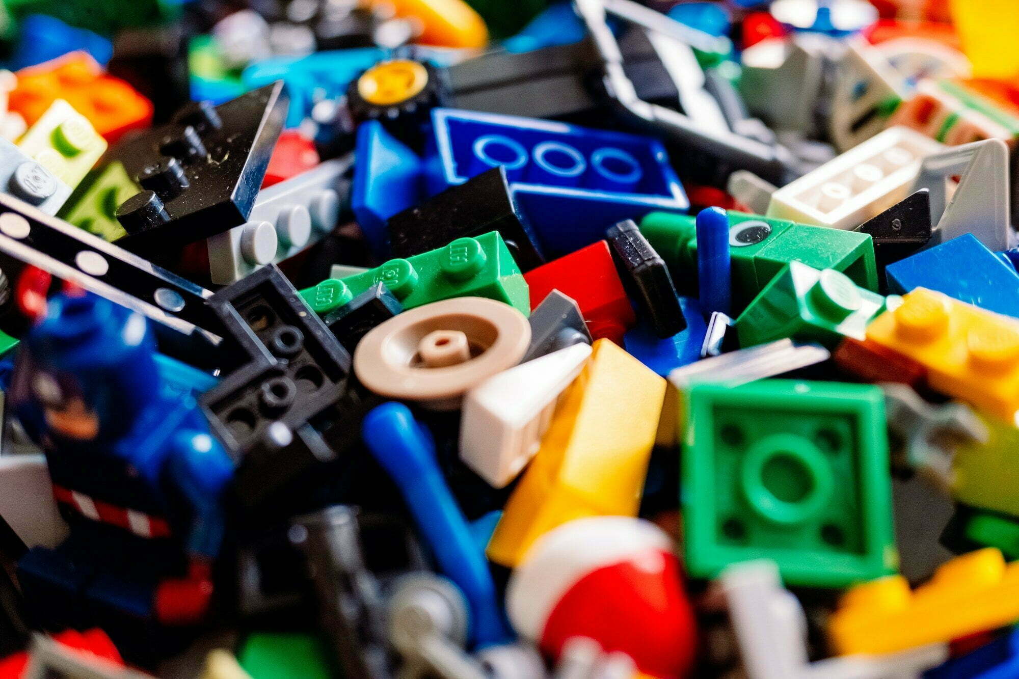 Valencia, spain – february 9, 2022: messy Lego pieces on the floor, detail. Valencia, spain - february 9, 2022: messy Lego pieces on the floor, detail.