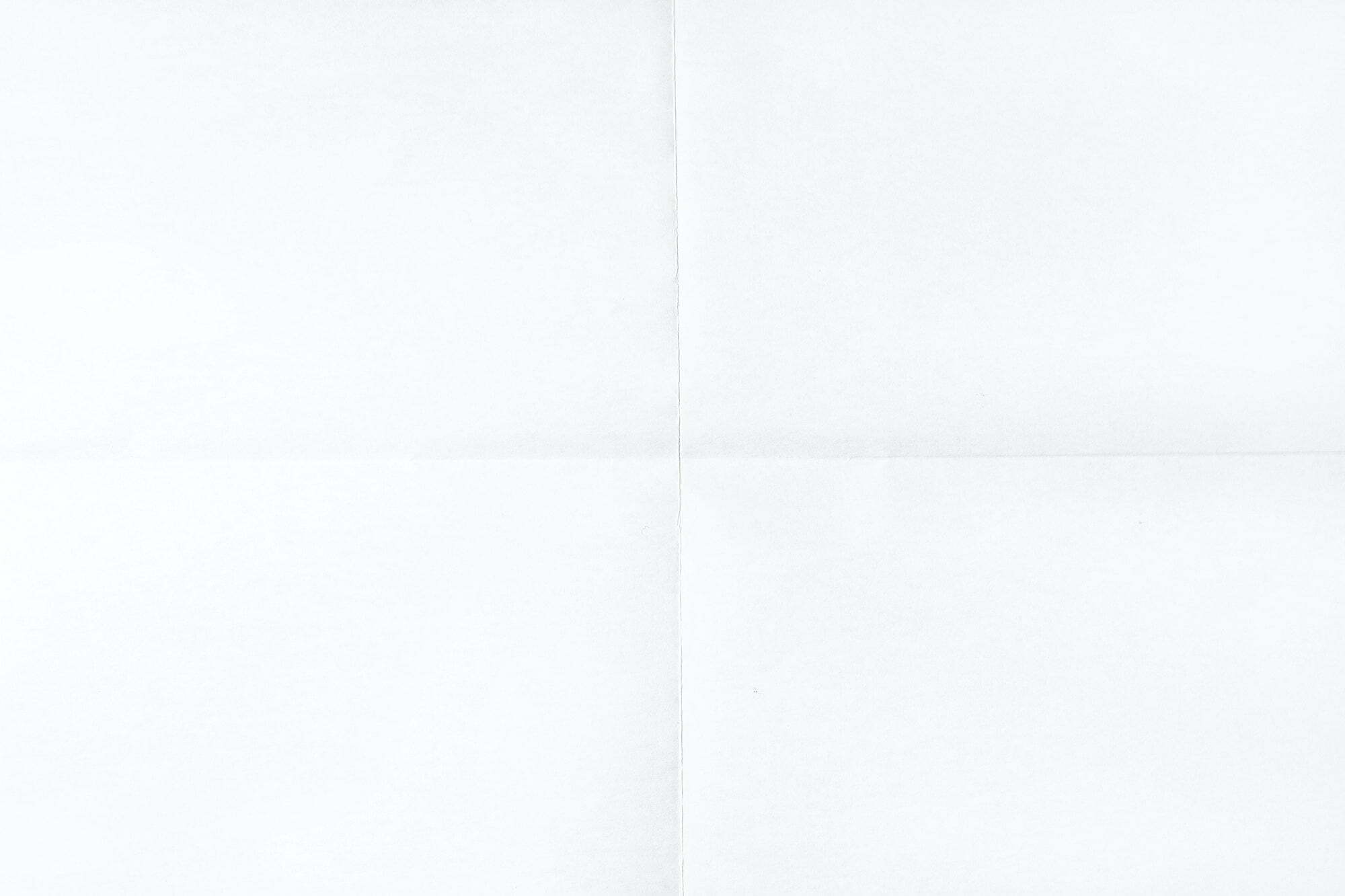 White crumpled unfolded paper sheet texture background White crumpled unfolded paper sheet texture background