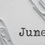 White plastic paper clips with June word